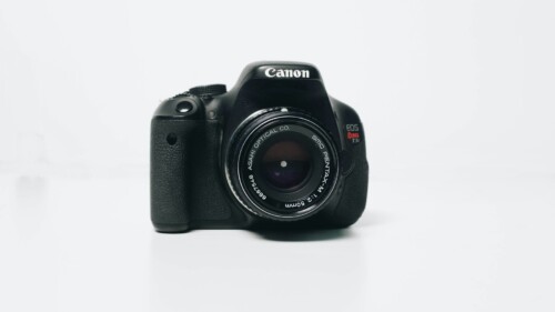 black Canon EOS Rebel-series DSLR camera
